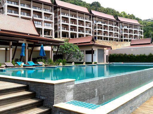 a modern pool outside a commercial building