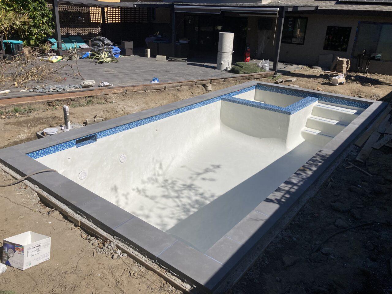 Pool resurfacing with white plaster at a Pasadena commercial property
