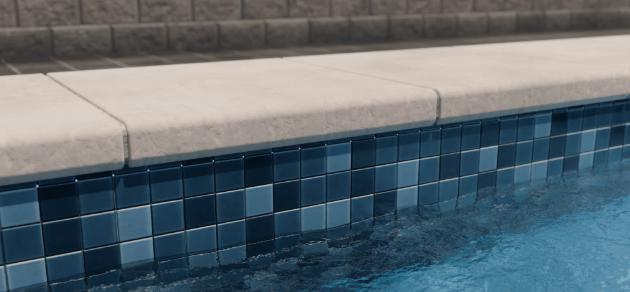 A picture of a swimming pool with new coping