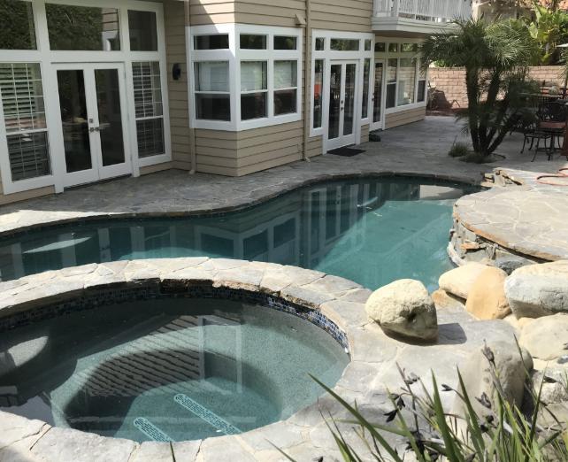 CPR Pools fire pit next to pool